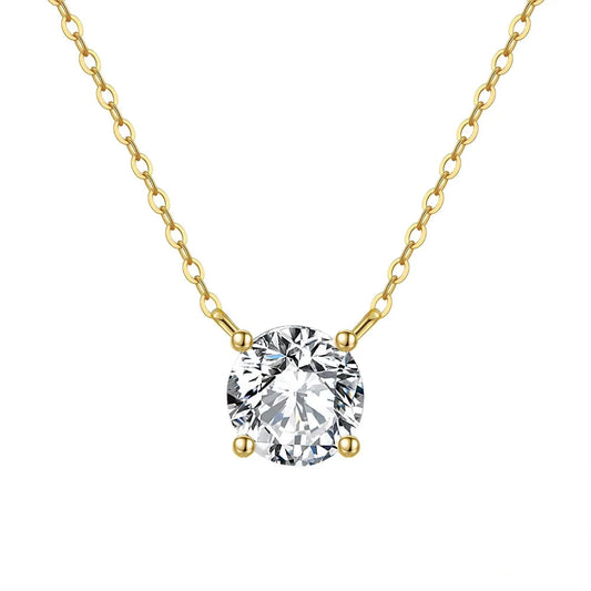 Veruccia Gold necklace with a clear gemstone pendant on a white background