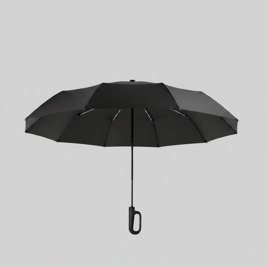 Black umbrella with ring buckle design on a beige background